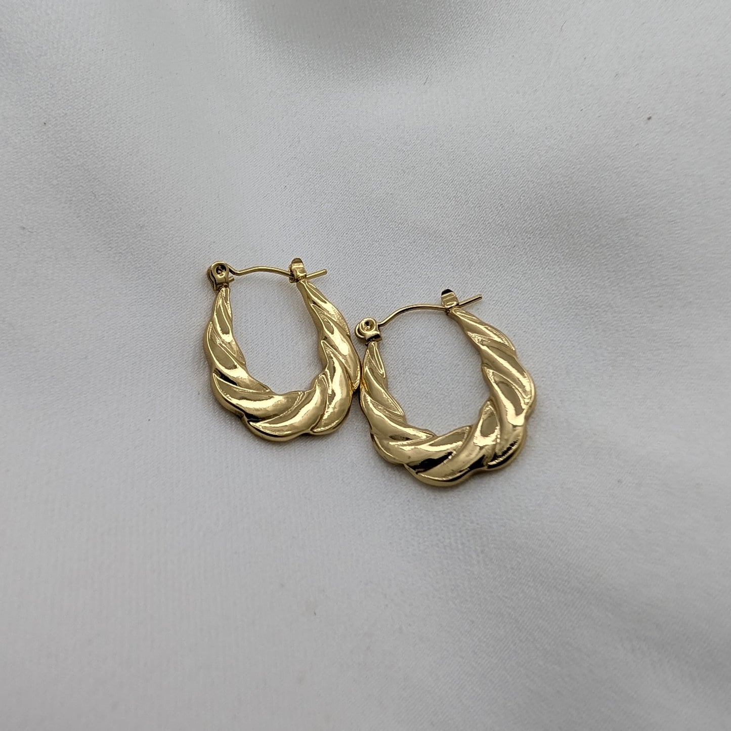 Luminous Twirl Hoops